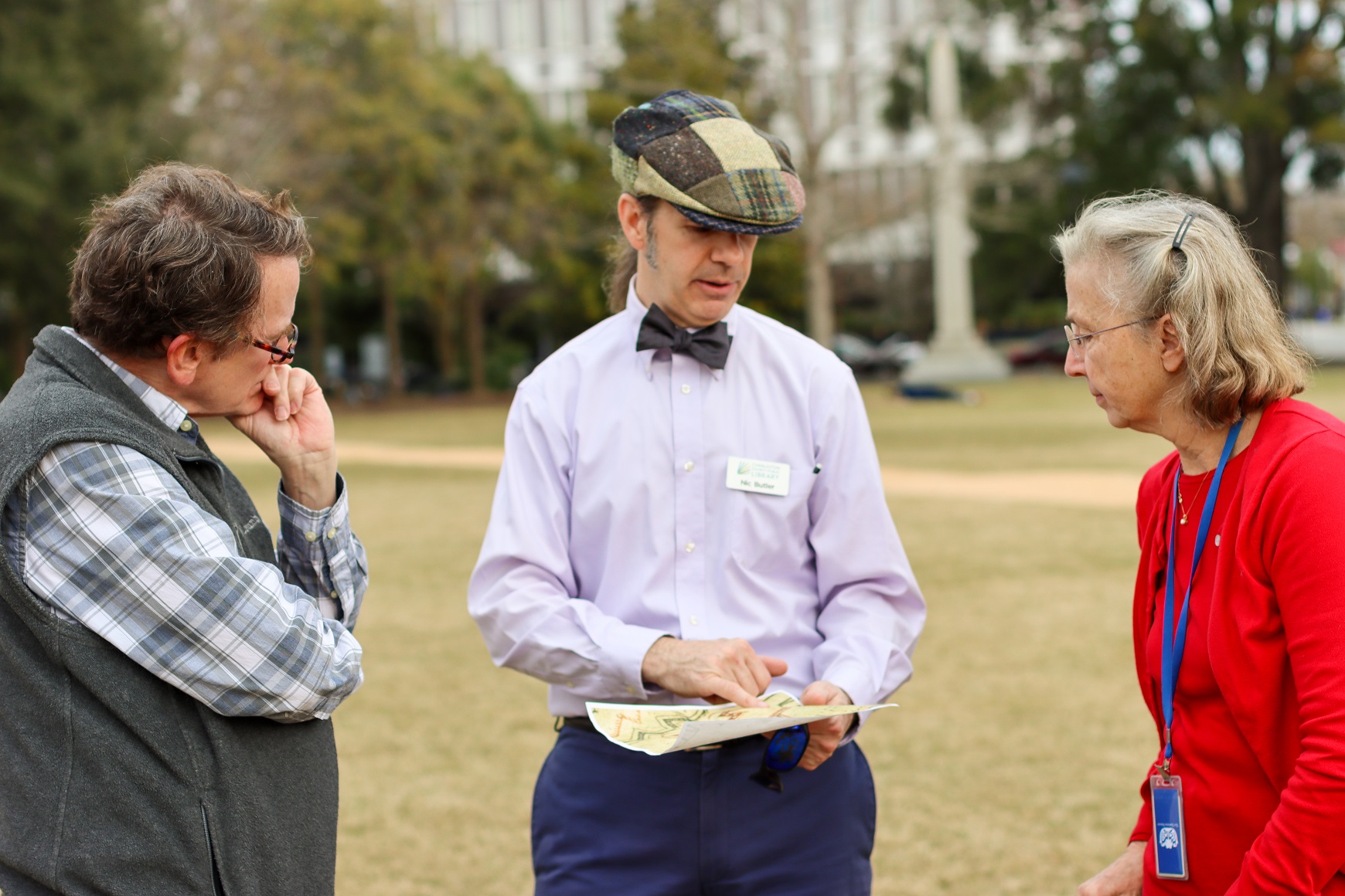 Dr. Nic Butler with the Charleston County Public Library points out points of interest on a rendering of the fortress in Marion Square that dates back to 1780.