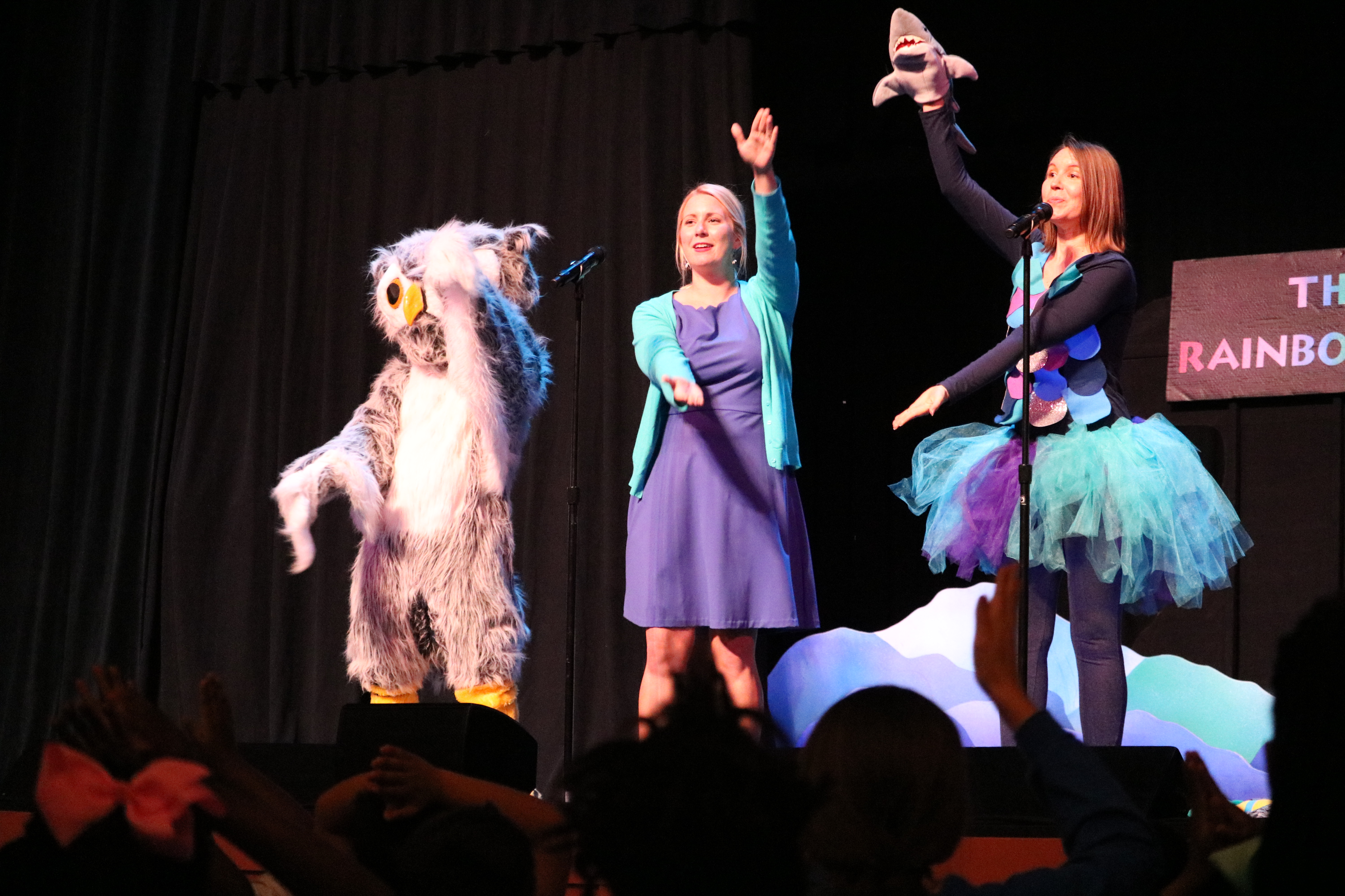 Devon, Jackie and Owlbert performing at the Gaillard Auditorium during an outreach