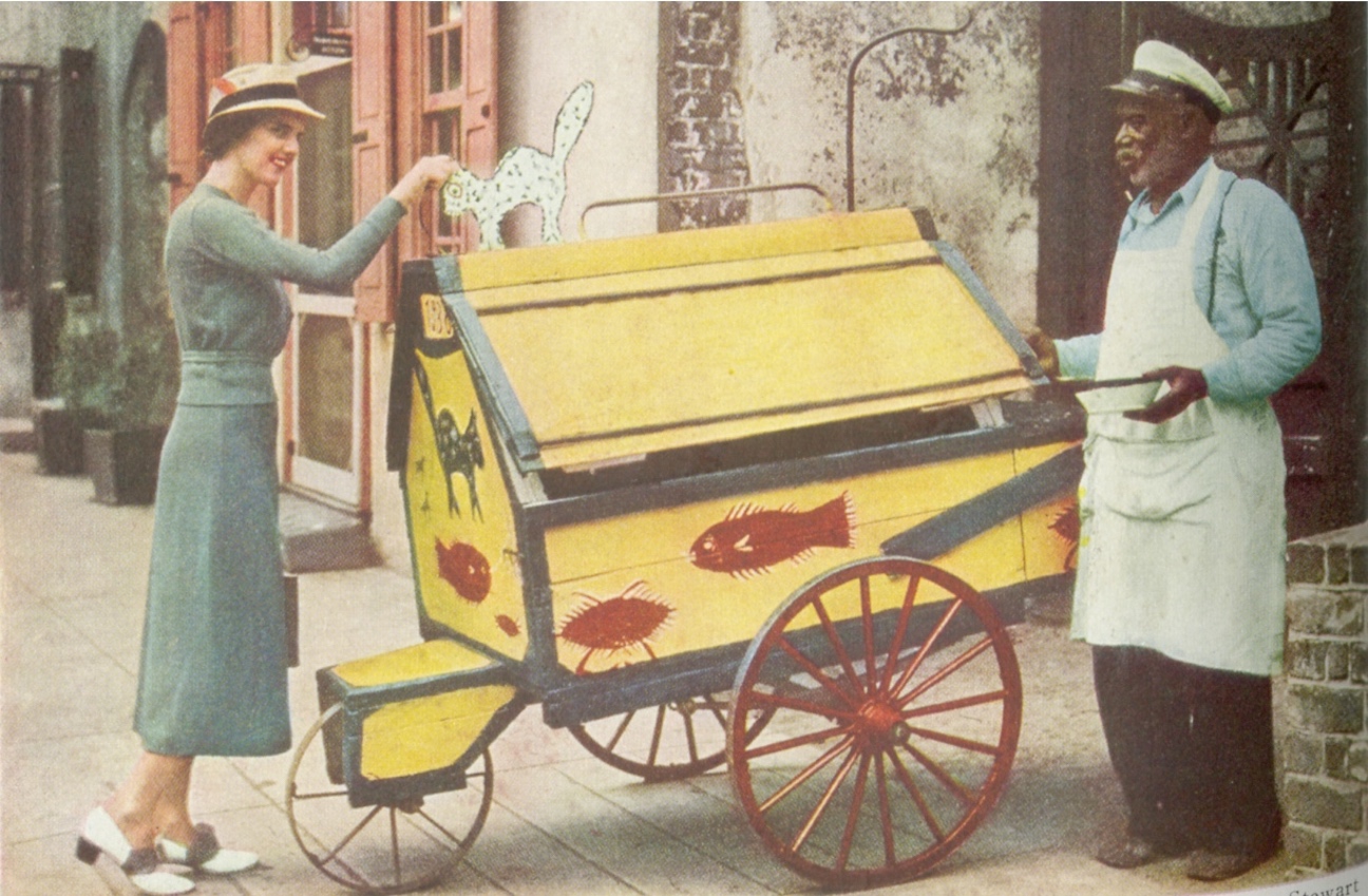 One of the images is from an old National Geographic. The man in the photo is John Wilson, voted &#039;Champion Huckster of Charleston&#039; in 1938 in Charleston, as shown in National Geographic. 