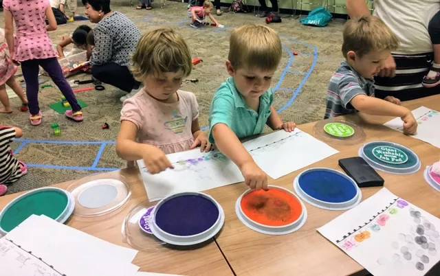 Kids enjoy a summer reading activity 