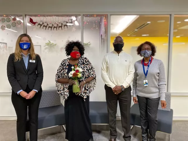 Melvin Graham (middle right), brother of the late Cynthia Graham Hurd, presented his sister&#039;s namesake award to CCPL staff member Sheila Heyward (middle left) during a virtual ceremony on Dec. 16.